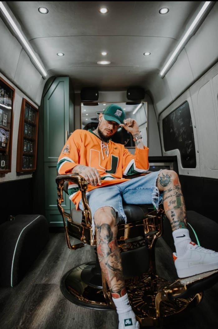 If you're lucky enough, you'll get a chance to sit in the gold-plated chair in Rivera's mobile barbershop